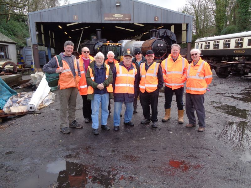 On our departure we were waylaid for a chat amongst the puddles, by Jimmy James far left, a volunteer and editor of the Bodmin  Wenford Railway Magazine.brPhotographer David BellbrDate taken 06032019