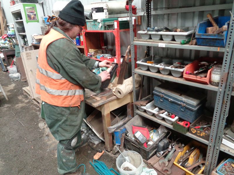 Finishing off a wooden widget for the side of brake van SR LDS55625 with the band sander, the latter kindly donated a few months ago.brPhotographer David BellbrDate taken 09052019