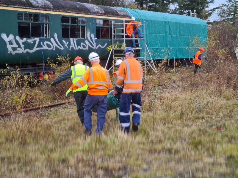 Moving the tarpaulinbrPhotographer Geoff HornerbrDate taken 06112024