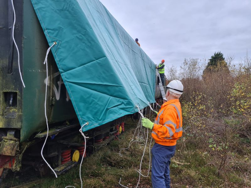 Positioning the tarpaulinbrPhotographer Geoff HornerbrDate taken 06112024