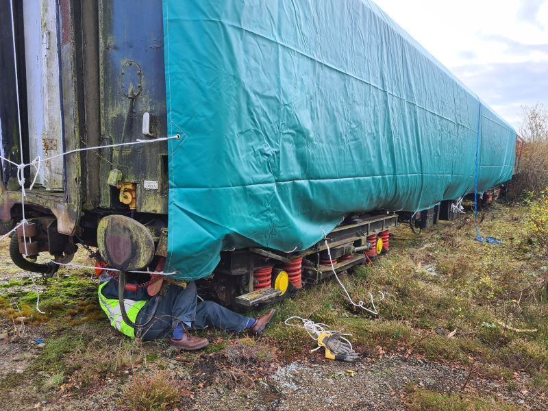 Tying down the tarpaulingbrPhotographer Geoff HornerbrDate taken 06112024