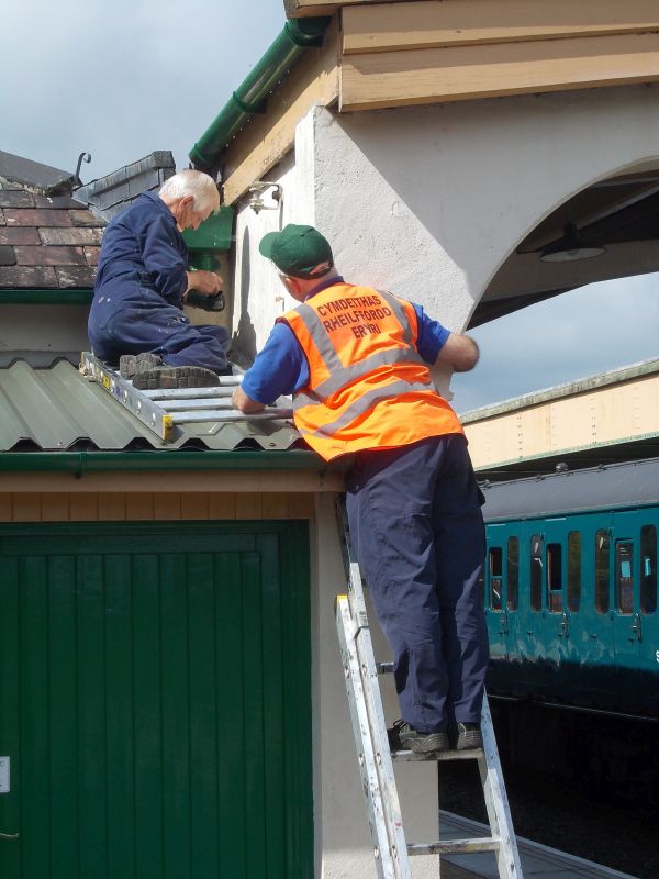 DRSA's hydrodynamic response team of John Coxon and Tom Baxter redirecting guttering to prevent damp getting into the Platform 2 disabled toilet.