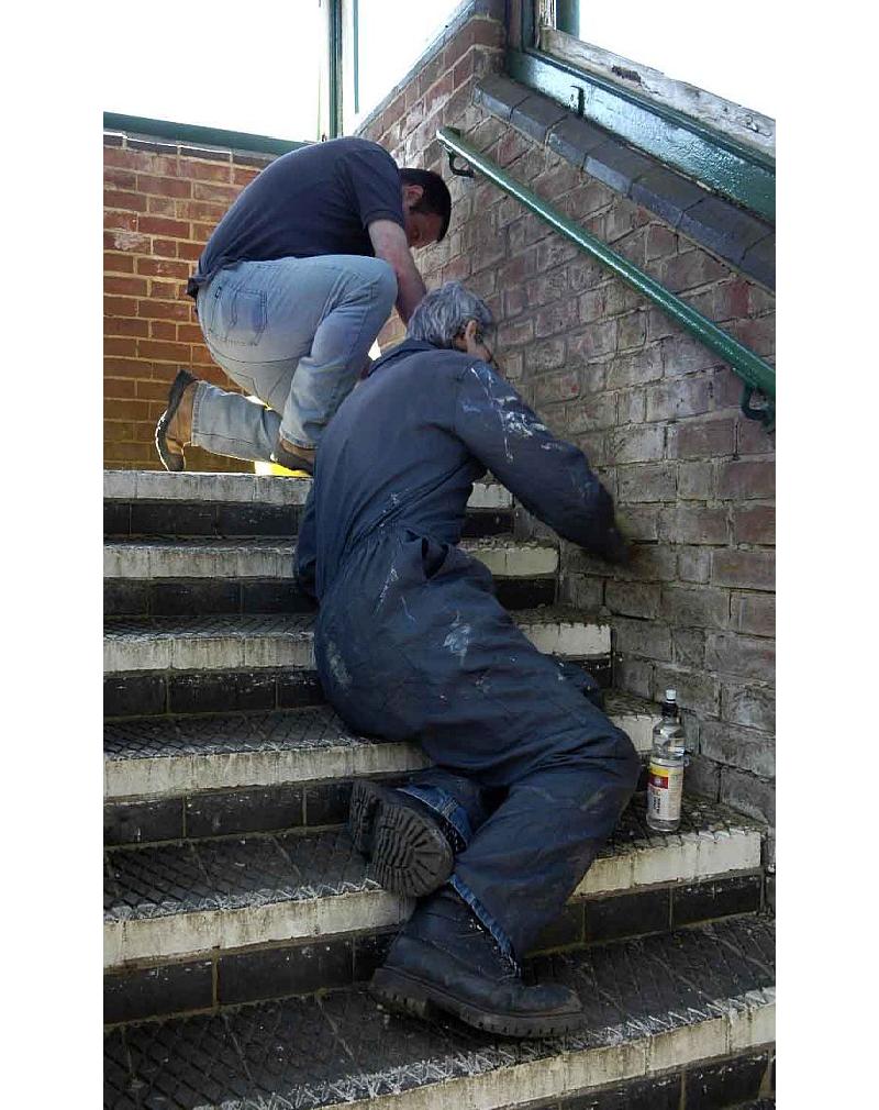 Daniel Roche (l) and Mark Williams re-pointing the brickwork of Okehampton footbridge